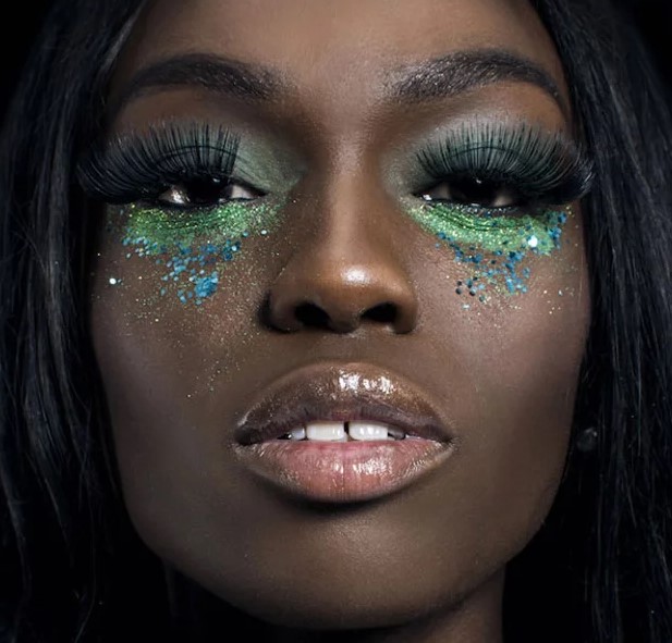 Model wearing biodegradable glitter