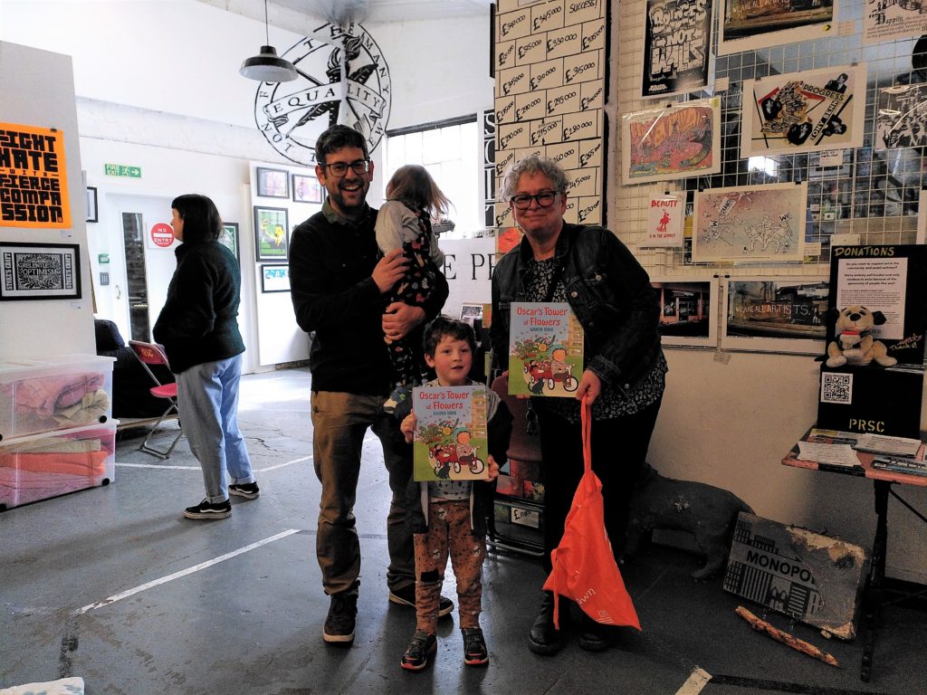 Group photo of attendees of the Oscar's Tower of Flowers utopia for kids event