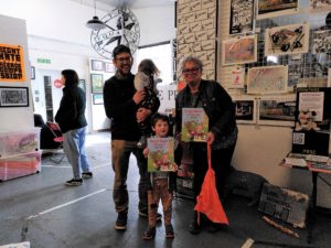 Group photo of attendees of the Oscar's Tower of Flowers utopia for kids event