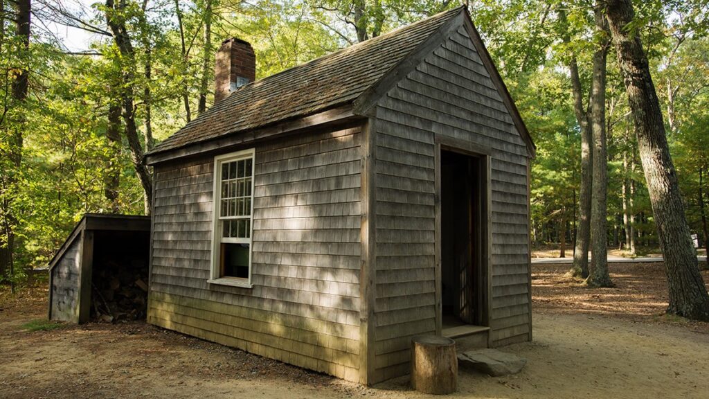 A photograph of a replica of Thoreau's cabin near Walden pond